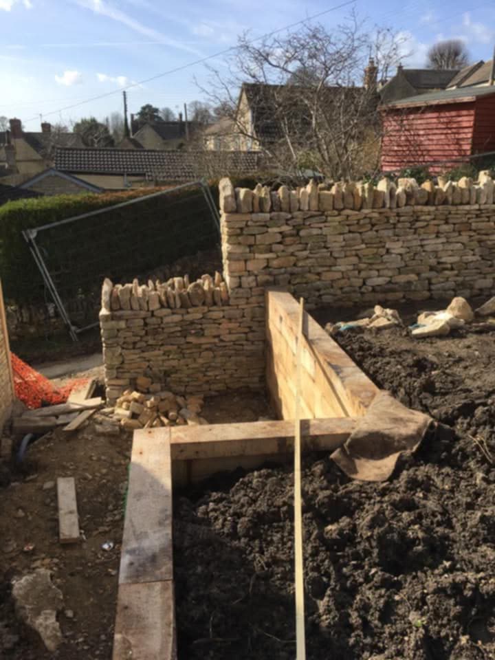 Dry stone wall repair in Cirencester, Cotswolds